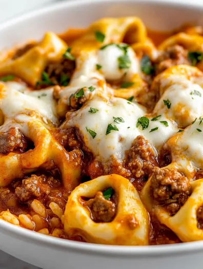 A plate of cheesy beef enchilada tortellini.
