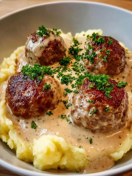 Meatballs on mashed potatoes.