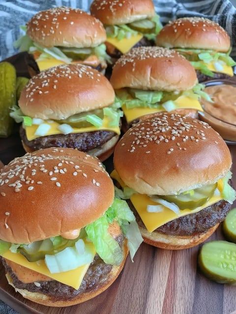 A plate of hamburger sandwiches.
